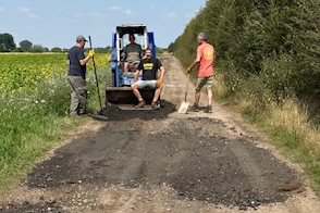 Black Bank pothole repair team